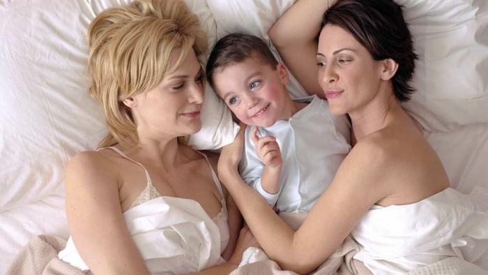 Thea Gill and Michelle Clunie in a promotional image for Showtime's 'Queer as Folk'