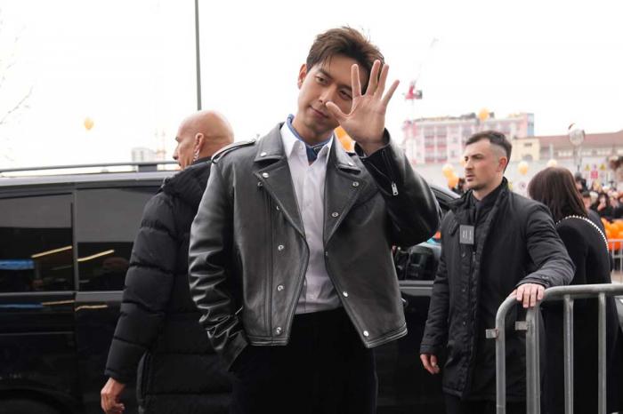 Li Xian arrives as he attends at the men's Prada Fall-Winter 2025-2026 collection show, that was presented in Milan, Italy, Sunday, Jan. 19, 2025