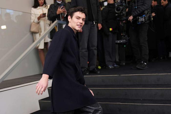 Louis Partridge arrives as he attends at the men's Prada Fall-Winter 2025-2026 collection show, that was presented in Milan, Italy, Sunday, Jan. 19, 2025