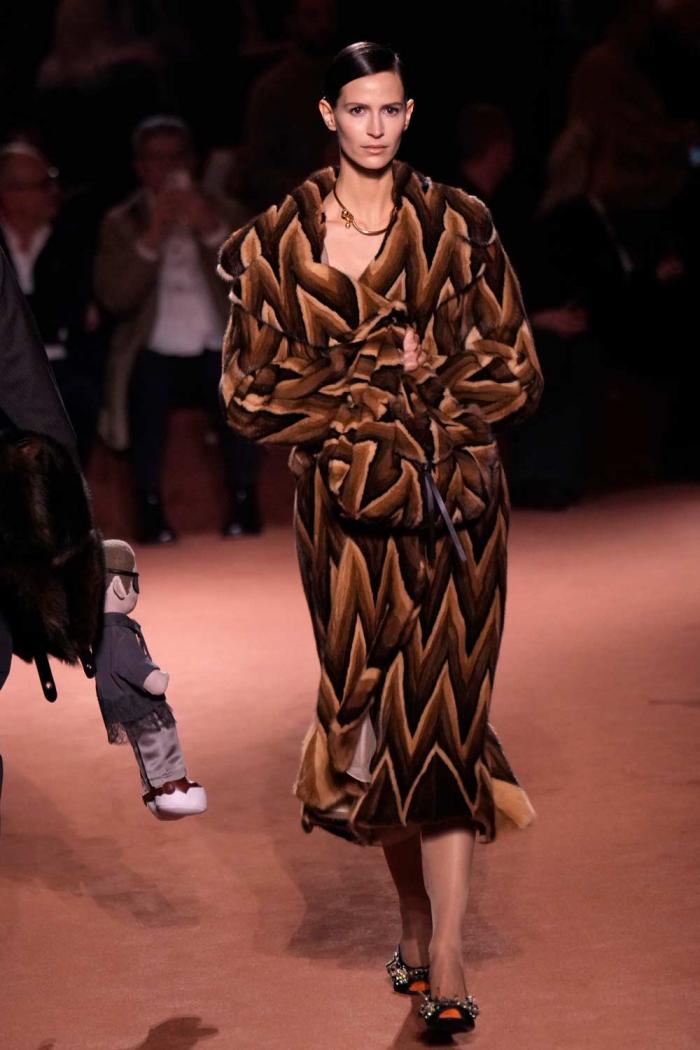 A model wears a creation of the Fendi Fall/Winter 2025-2026 women's collection presented in Milan, Italy, Wednesday, Feb. 26, 2025