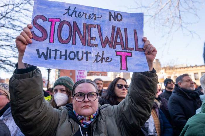 People protest the removal of the word "transgender" from the Stonewall National Monument website during a rally outside of The Stonewall Inn on February 14, 2025 in New York City. (Getty Images)