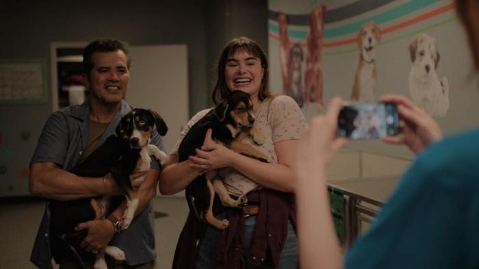 John Leguizamo and Barbie Ferreira in a scene from "Bob Trevino Likes It."