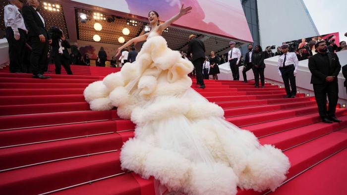 Wan QianHui poses for photographers during the opening ceremony red carpet of the 78th international film festival, Cannes, southern France, Tuesday, May 13, 2025