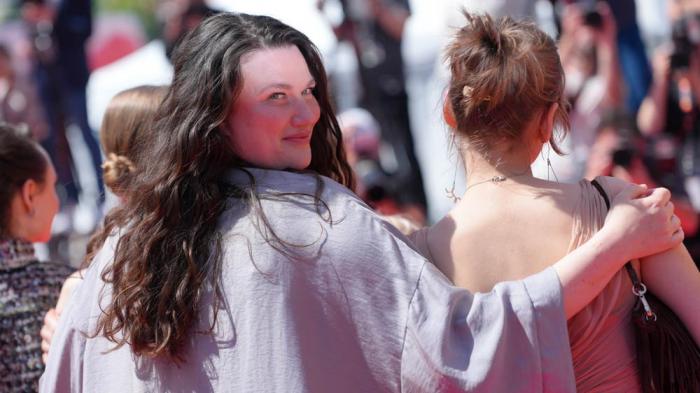 Director Mascha Schilinski poses for photographers upon arrival at the premiere of the film 'Sound of Falling' at the 78th international film festival, Cannes, southern France, Wednesday, May 14, 2025