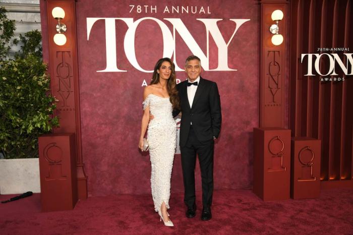 Amal Clooney, left, and George Clooney arrive at the 78th Tony Awards on Sunday, June 8, 2025, at Radio City Music Hall in New York