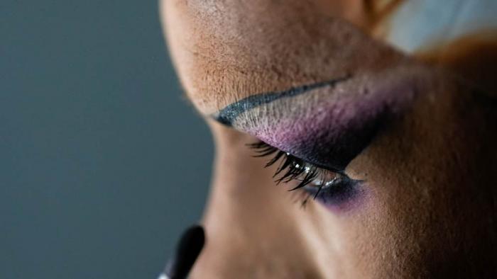 Mari Con Carne applies their makeup before attending Les Miserables at the Kennedy Center in drag, on the night that President Donald Trump and first lady Melania Trump were also in attendance, Wednesday, June 11, 2025, in Washington