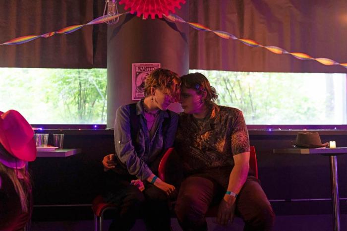 Couple Michael, right, and Perse talk during a "Pink Pony Prom" held to celebrate teen and young adult members of the LGBTQ+ community on Friday, May 30, 2025, in Portland, Ore.