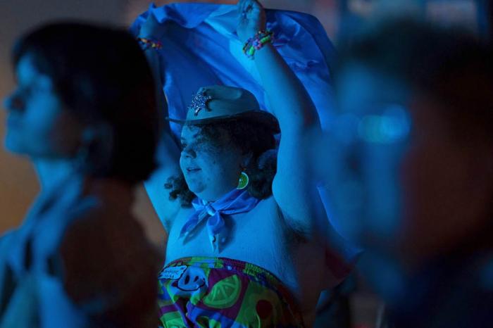 Ambrose dances during a "Pink Pony Prom" on Friday, May 30, 2025, in Portland, Ore.