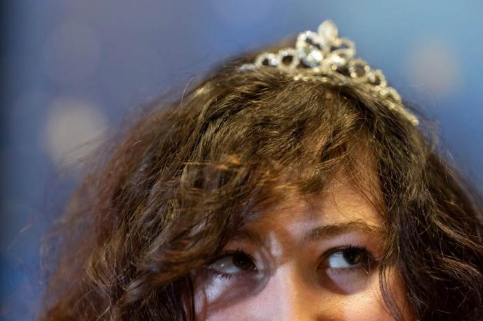 Jason Schubert wears a tiara during a "Pink Pony Prom" on Friday, May 30, 2025, in Portland, Ore.