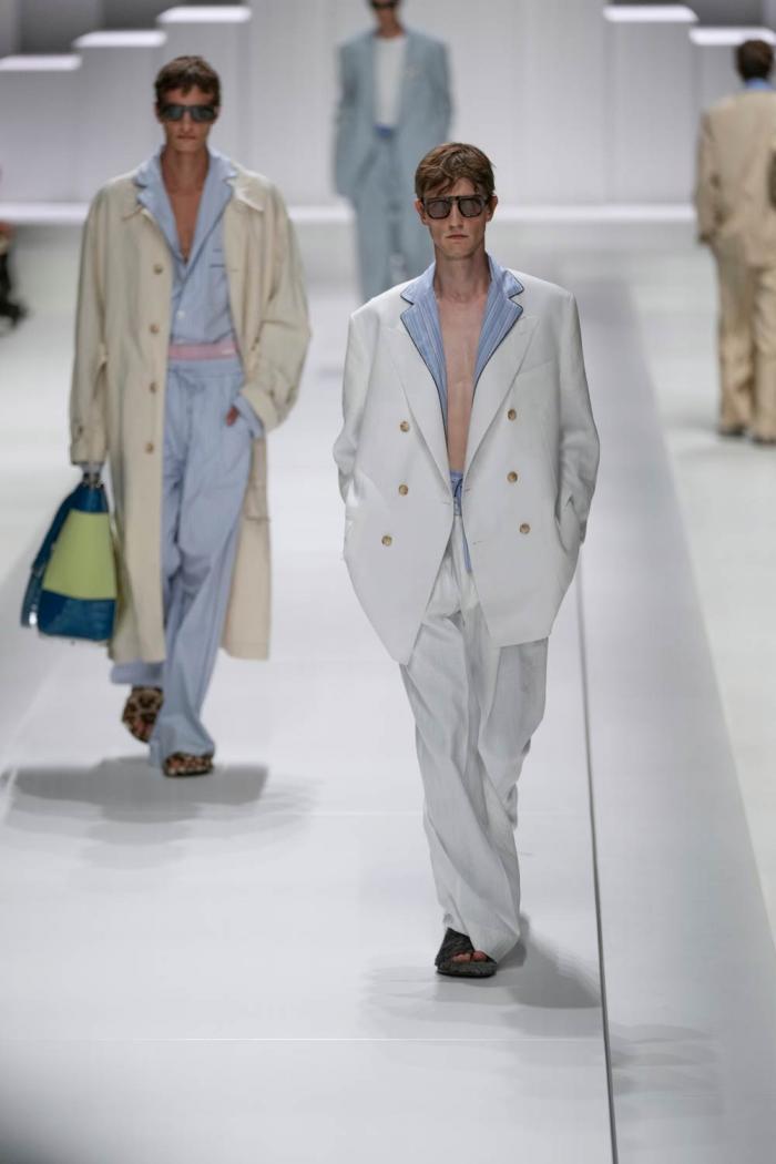 Models wear creations as part of the men's Dolce & Gabbana Spring-Summer 2026 collection, that was presented in Milan, Italy, Saturday, June 21, 2025
