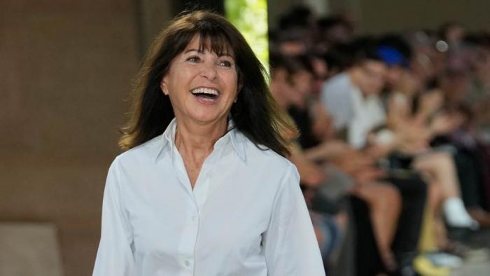 Fashion designer Veronique Nichanian acknowledges applause after the presentationof the men's Hermes Spring-Summer 2026 collection, that was presented in Paris Saturday, June 28, 2025