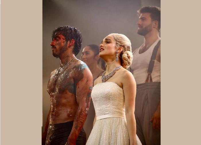 Diego Andres Rodriguez and Rachel Zegler in a curtain call for "Evita"