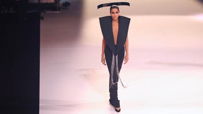 A model wears a creation as part of the Stephane Rolland Fall-Winter 2025/26 Haute Couture collection presented Tuesday, July 8, 2025, in Paris