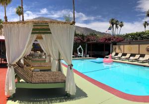 Poolside cabanas at Tortuga del Sol