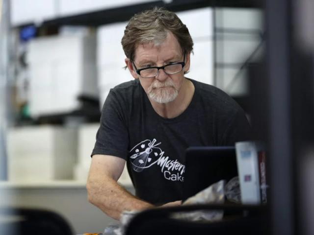 Baker Jack Phillips, owner of Masterpiece Cakeshop, manages his shop in Lakewood, Colo.