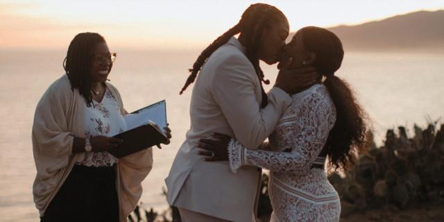 Rev. Whittney Ijanaten officiating a wedding