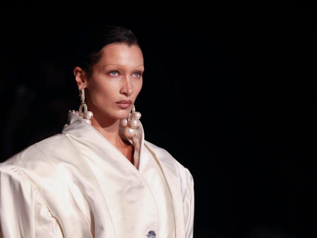 Bella Hadid wears a creation for the Vivienne Westwood ready-to-wear Spring/Summer 2023 fashion collection presented Saturday, Oct. 1, 2022 in Paris. (Photo by Vianney Le Caer/Invision/AP)