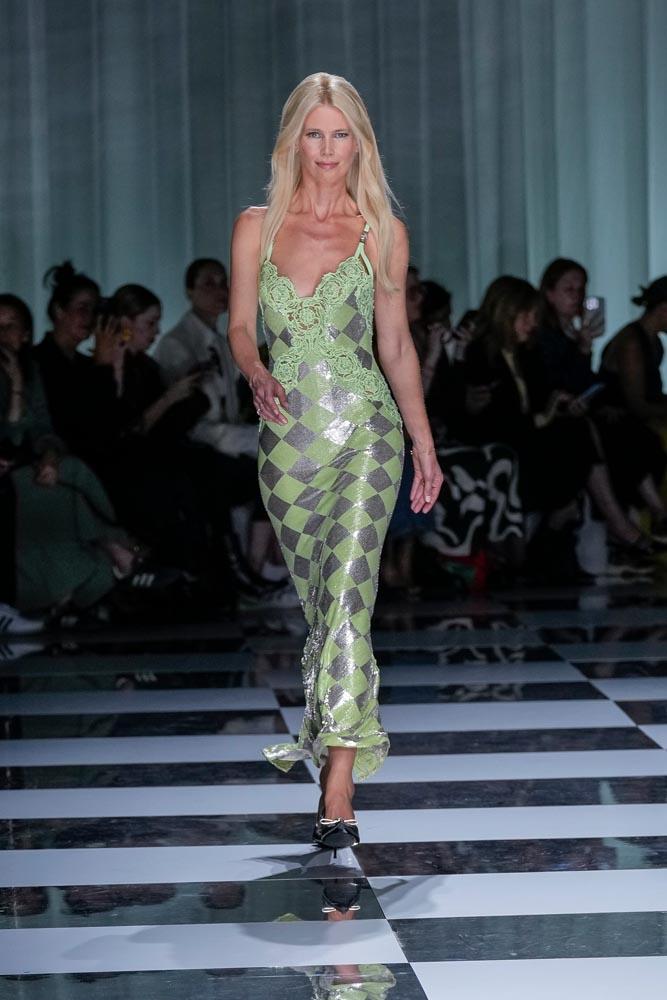 Claudia Schiffer wears a creation as part of the Versace women's Spring Summer 2024 collection presented in Milan, Italy, Friday, Sept. 22, 2023. (AP Photo/Antonio Calanni)