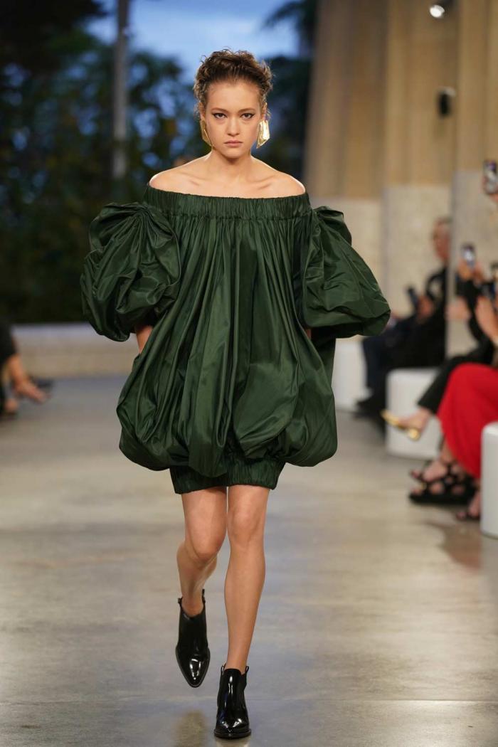 A model wears a creation by Louis Vuitton during a fashion show for the Cruise 2025 collection in the Park Guell in Barcelona, Spain, Thursday, May 23, 2024