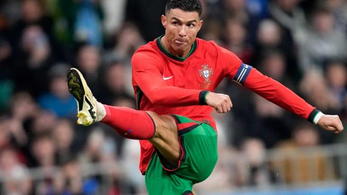 Portugal's Cristiano Ronaldo attempts a shot at goal during the international friendly soccer match between Slovenia and Portugal at the Stozice stadium in Ljubljana, Slovenia, Tuesday, March 26, 2024