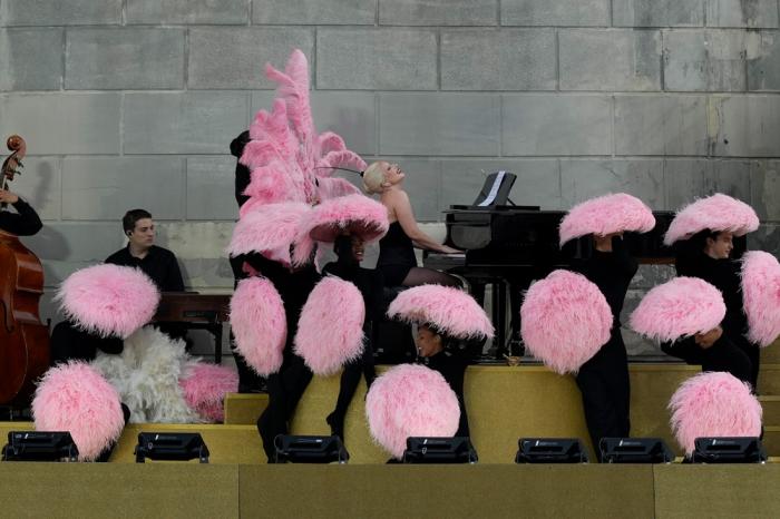 Lady Gaga performs in Paris, France, ahead of the opening ceremony of the 2024 Summer Olympics, Friday, July 26, 2024. (AP Photo/Luca Bruno)