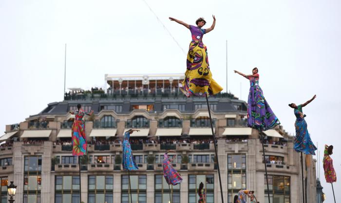 Acrobats perform during the opening ceremony for the 2024 Summer Olympics in Paris, France, Friday, July 26, 2024. (Maddie Meyer/Pool Photo via AP)