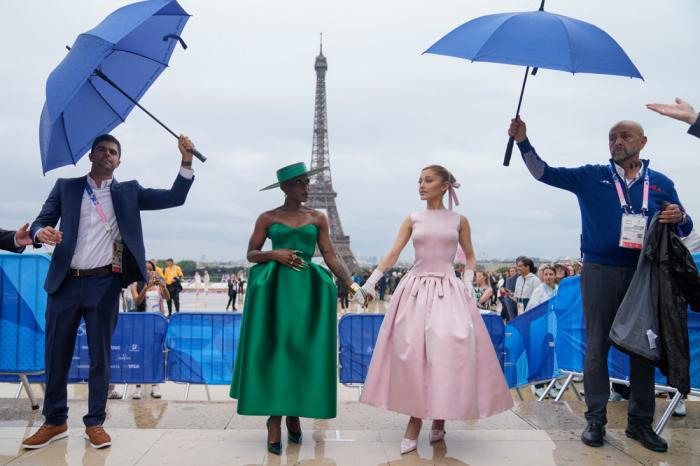 Entertainers Ariana Grande, right, and Cynthia Erivo arrive in Paris, France, before the opening ceremony of the 2024 Summer Olympics, Friday, July 26, 2024. (AP Photo/Natacha Pisarenko)