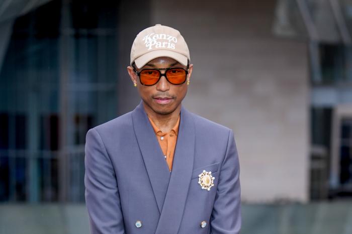 Pharrell Williams upon arrival at the Louis Vuitton Foundation on the eve of Paris Olympics opening ceremony, at the 2024 Summer Olympics, Thursday, July 25, 2024, in Paris, France. (AP Photo/Rebecca Blackwell)