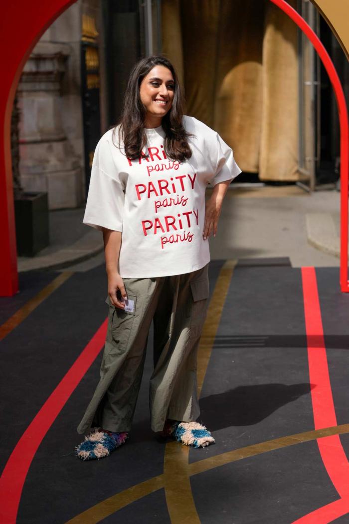 Qatari swimmer Nada Mohamed Wafa wears a creation by 4TheWalk and CALLA Paris, during the first gender equal Olympic Games fashion show, at the 2024 Summer Olympics in Paris, France, Sunday, July 28, 2024