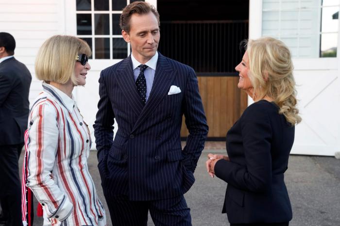 Anna Wintour, from left, Tom Hiddleston and First Lady of the United States, Dr. Jill Biden attend the Ralph Lauren Spring/Summer 2025 fashion show as part of New York Fashion Week on Thursday, Sept. 5, 2024, at Khalily Stables in Bridgehampton, N.Y.