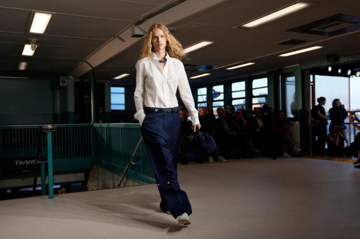 A model walks the runway during the Tommy Hilfiger Spring/Summer 2025 fashion show onboard a Staten Island Ferry as part of New York Fashion Week on Sunday, Sept. 8, 2024, in New York