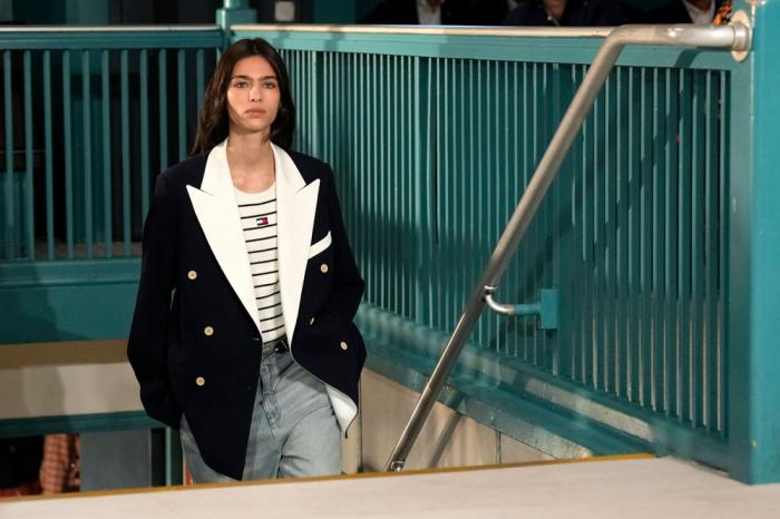 A model walks the runway during the Tommy Hilfiger Spring/Summer 2025 fashion show onboard a Staten Island Ferry as part of New York Fashion Week on Sunday, Sept. 8, 2024, in New York