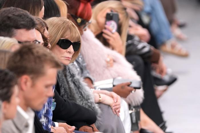 Anna Wintour watches models walk the runway during the Michael Kors Collection spring/summer 2025 fashion show as part of New York Fashion Week, Tuesday, Sept. 10, 2024, in New York