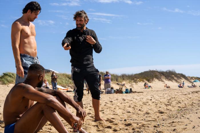 Left to Right:  James Bland (sitting), Marco Pigossi, and Writer/Director Marco Calvani on the set of "High Tide"