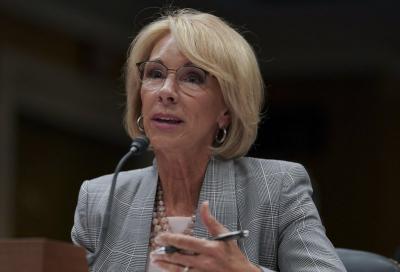 Betsy DeVos testifies during a Senate Subcommittee meeting, June 2018