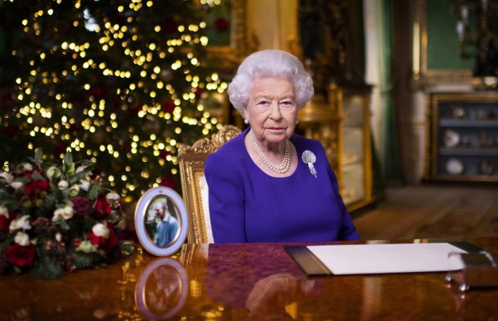 In this undated photo issued on Friday Dec. 25, 2020, Britain's Queen Elizabeth II records her annual Christmas broadcast in Windsor Castle, Windsor, England. (Victoria Jones/Pool via AP)