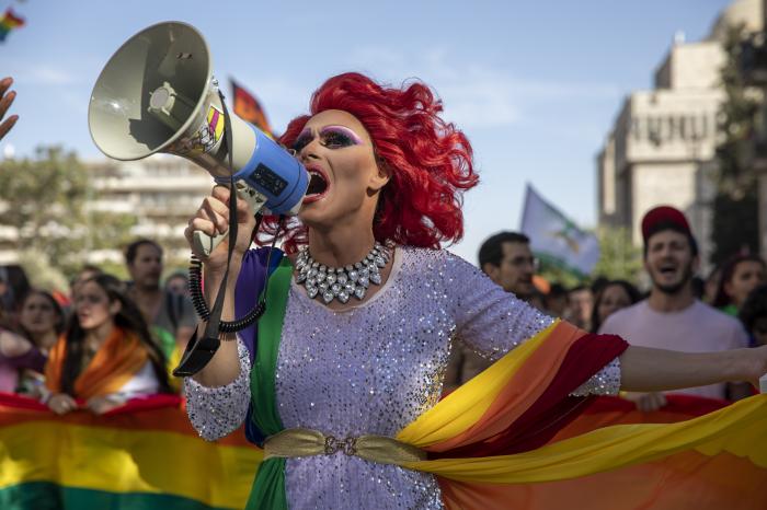 A participant dances in the annual Gay Pride parade in Jerusalem.