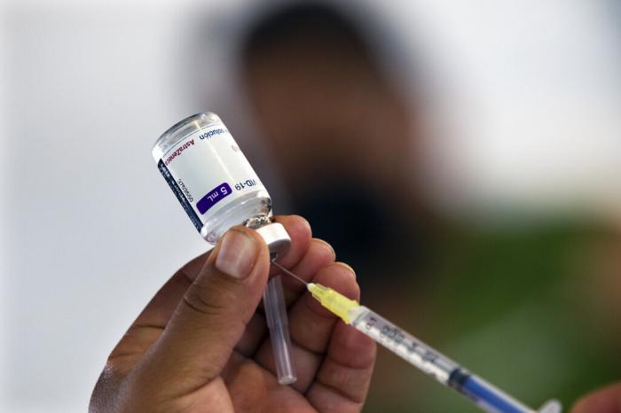 A health worker prepares to administer a jab of the AstraZeneca COVID-19 vaccine.