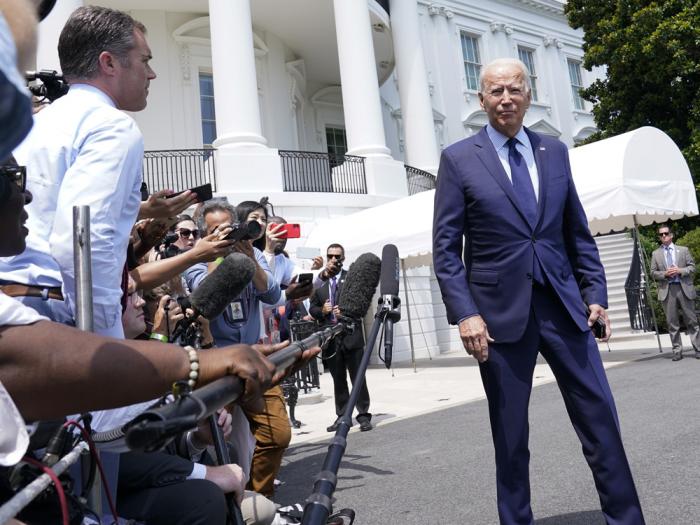 President Joe Biden walks past reporters as he heads to Marine One on the South Lawn of the White House in Washington, Friday, July 16, 2021, to spend the weekend at Camp David