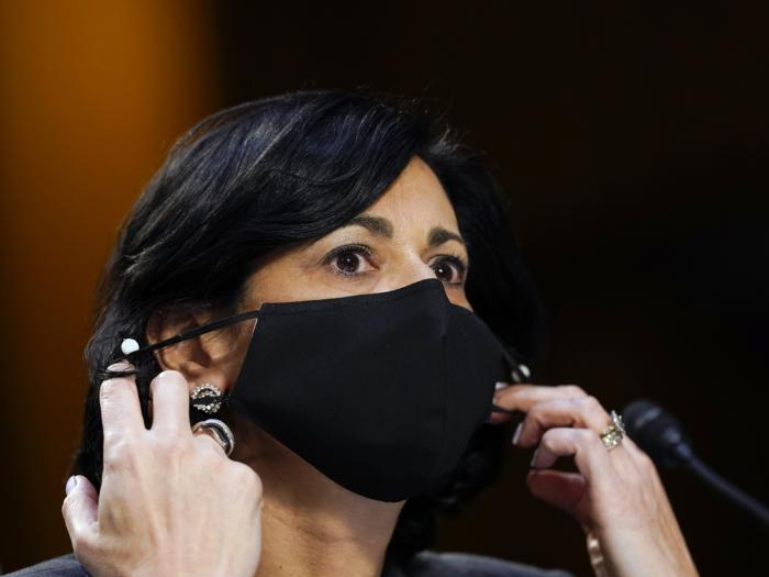 Dr. Rochelle Walensky, director of the Centers for Disease Control and Prevention, adjusts her face mask during a Senate Health, Education, Labor and Pensions Committee hearing on the federal coronavirus response on Capitol Hill in Washington, in this Thursday, March 18, 2021, file photo