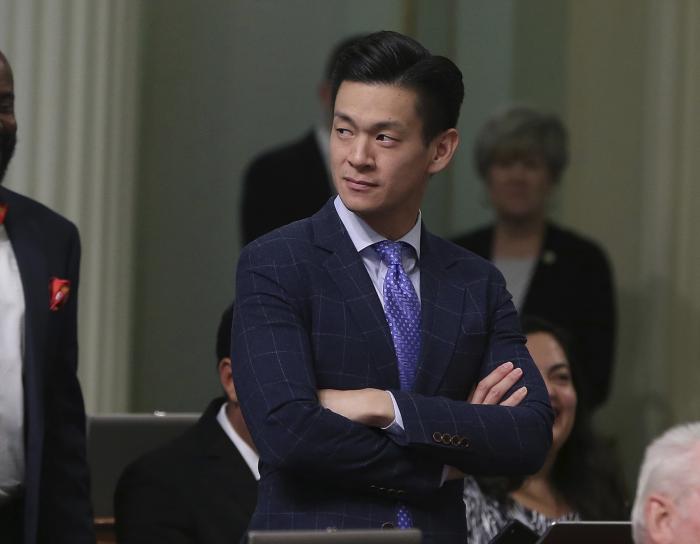 Assemblyman Evan Low, D-Campbell, watches the debate over a bill during the Assembly session in Sacramento, Calif.