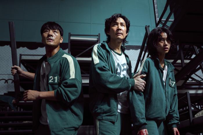 From left, Park Hae-soo, Lee Jung-jae and Jung Ho-yeon in a scene from "Squid Game."