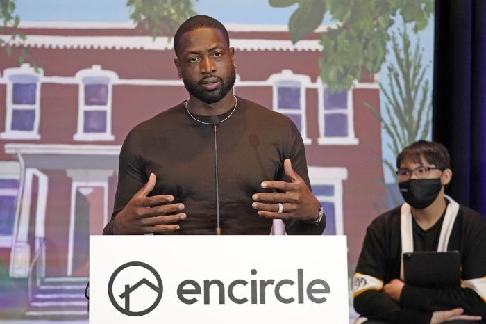 NBA All-Star Dwyane Wade speaks during a news conference Wednesday, Oct. 13, 2021, in Salt Lake City.
