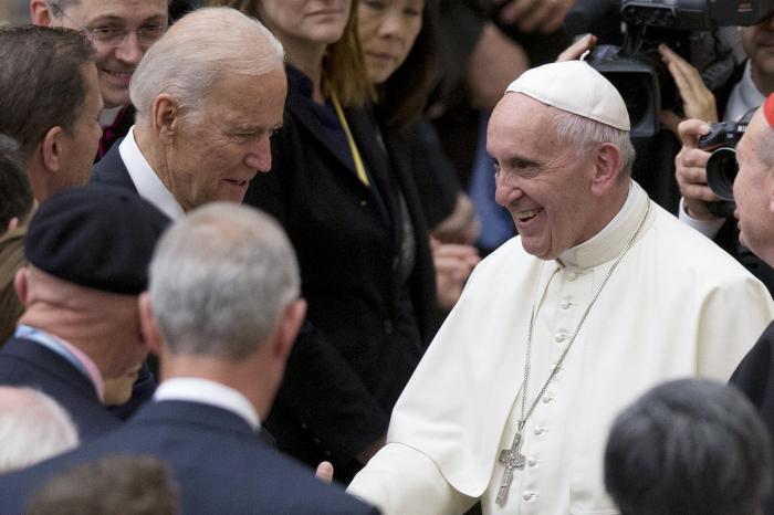 Pope Francis shakes hands with Vice President Joe Biden.
