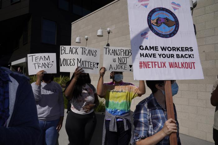 People protest outside the Netflix building in the Hollywood section of Los Angeles.