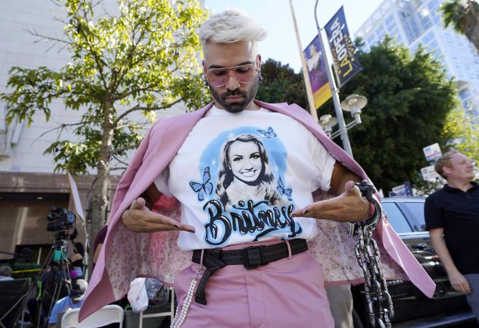 New Jersey performer and Britney Spears supporter "Brennyboombox" shows off his T-shirt outside a hearing concerning the pop singer's conservatorship at the Stanley Mosk Courthouse in L.A.