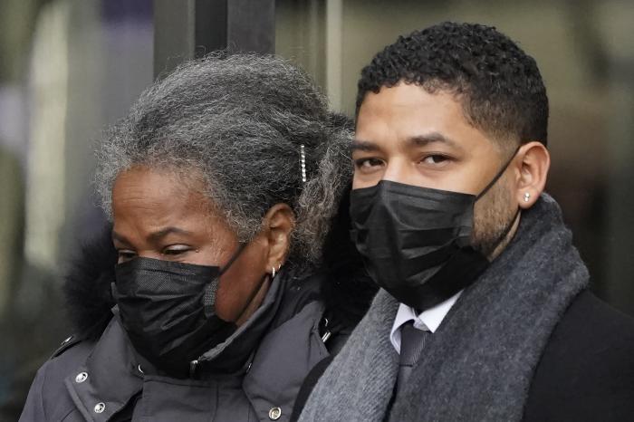 Actor Jussie Smollett departs Tuesday, Dec. 7, 2021, with his mother Janet, the Leighton Criminal Courthouse after day six of his trial in Chicago.