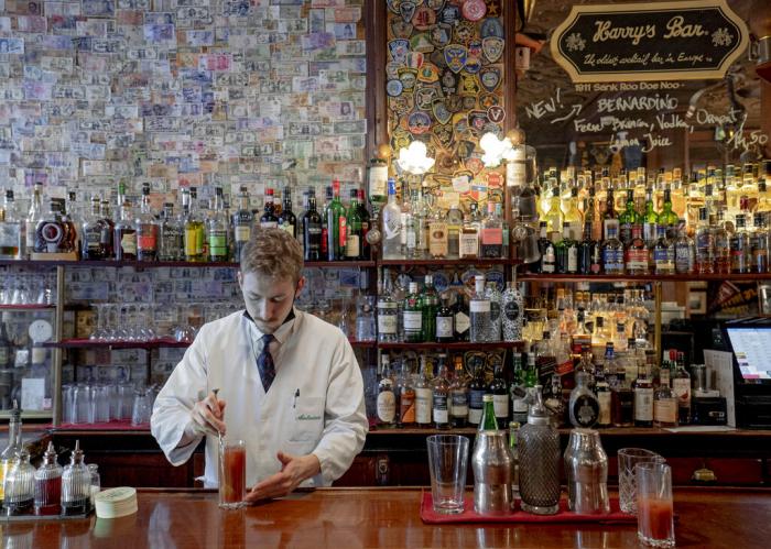 Bartender Antoine prepares a Bloody Mary cocktail at Harry's Bar in Paris.
