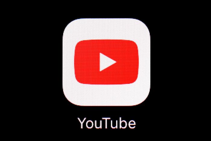 The YouTube app is shown on an iPad on March 20, 2018.