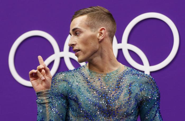 Adam Rippon of the United States reacts as his score is posted following his performance in the men's free figure skating final in the Gangneung Ice Arena at the 2018 Winter Olympics in Gangneung, South Korea.